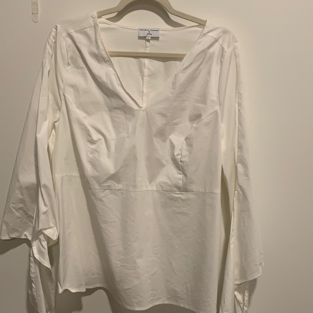 White blouse with tie sleeve detail